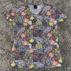 Gently worn scrub top.
